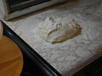 Dust dough with some flour