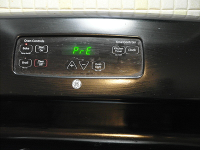 Warm oven slightly